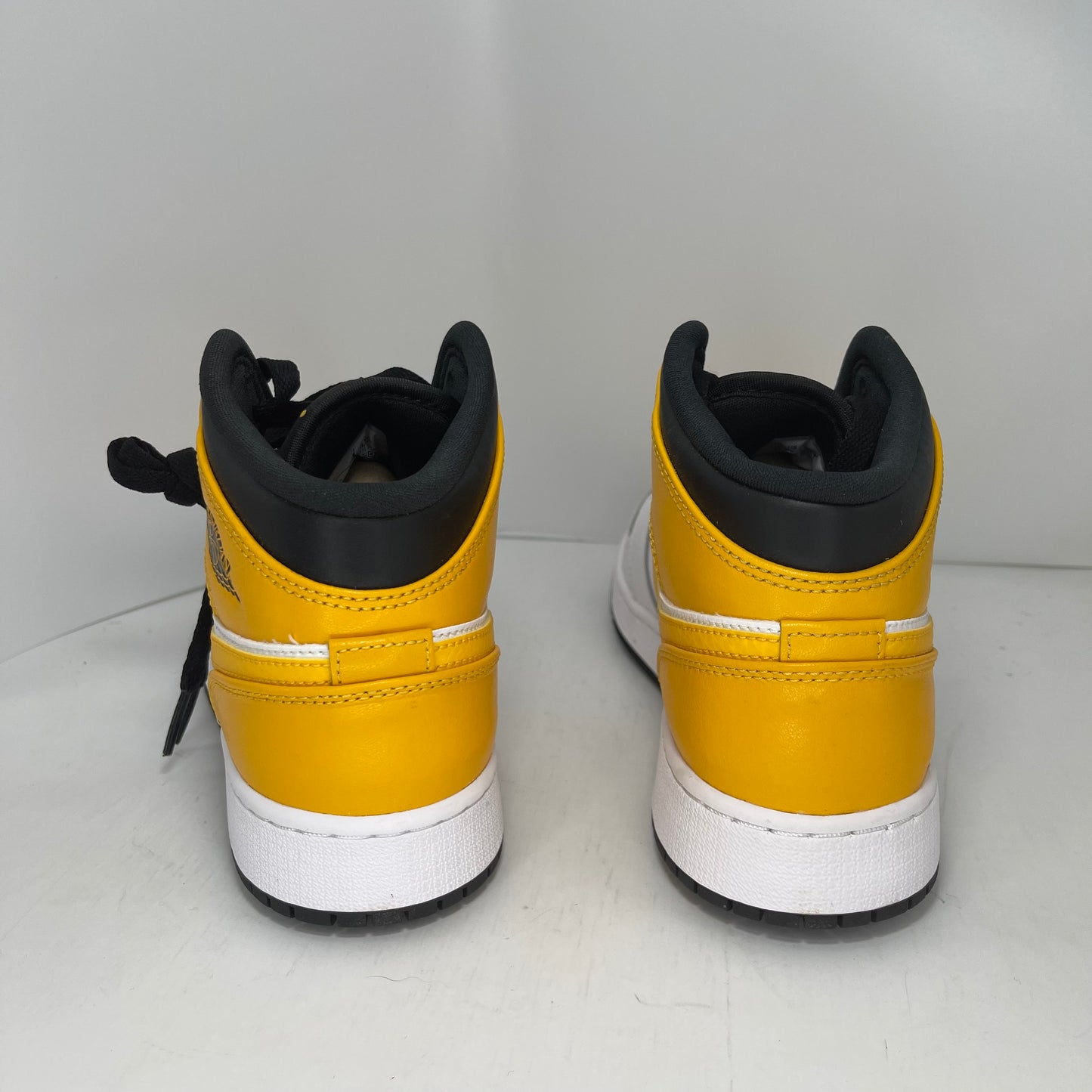 Air Jordan 1 Mid University Gold Grade School