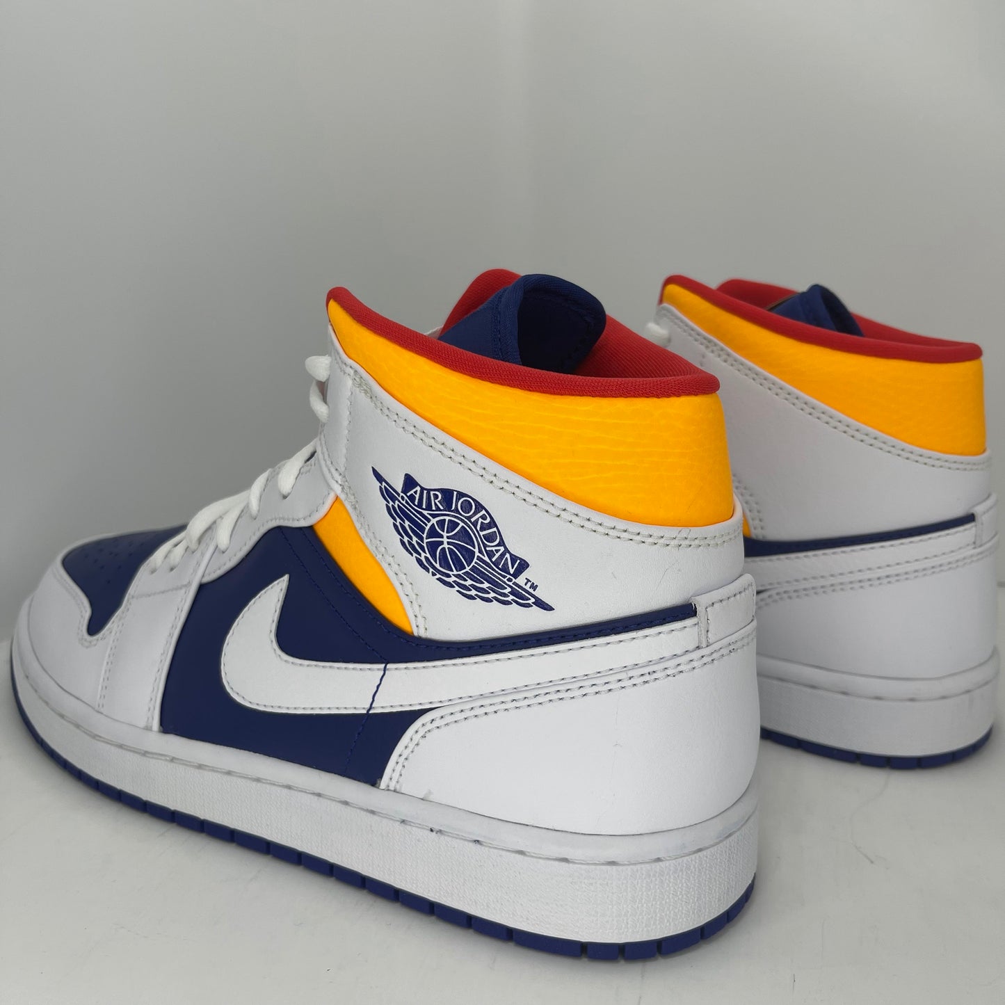 Jordan 1 Mid Royal Blue Laser Orange MENS